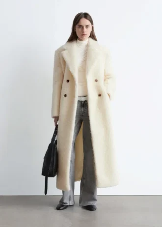 Manteau long en laine et peau de mouton