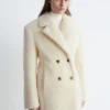 Manteau long en laine et peau de mouton