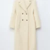 Manteau long en laine et peau de mouton