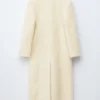 Manteau long en laine et peau de mouton