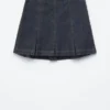 Mini-jupe en denim plissé