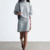Mini-robe en jersey à col roulé