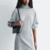 Mini-robe en jersey à col roulé