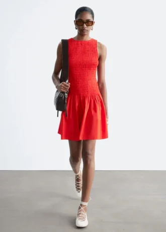 Mini-robe en popeline de coton smockée