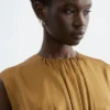 Mini-robe en soie froncée