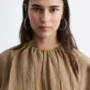 Mini-robe à manches courtes froncée