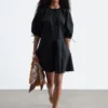 Mini-robe à manches volumineuses