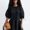 Mini-robe à manches volumineuses
