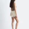 Mini-short en jacquard avec empiècement en dentelle
