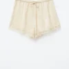 Mini-short en jacquard avec empiècement en dentelle