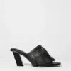 Mules en cuir à franges