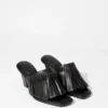 Mules en cuir à franges