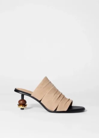 Mules en cuir ornées de perles