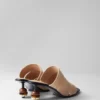 Mules en cuir ornées de perles