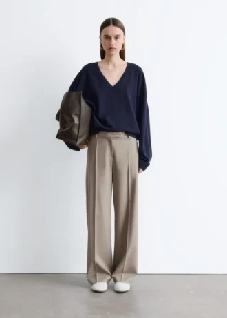 Pantalon en laine à plis marqués