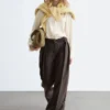 Pantalon en laine à plis marqués