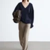 Pantalon en laine à plis marqués