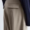 Pantalon en laine à plis marqués