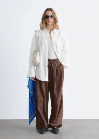 Pantalon à jambes larges et cordon de serrage