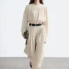 Pantalon à jambes évasées et plis