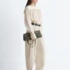 Pantalon à jambes évasées et plis