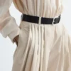 Pantalon à jambes évasées et plis