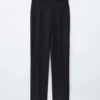 Pantalon slim à plis marqués