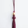 Pendentif en cuir à pompon