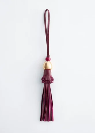 Pendentif en cuir à pompon