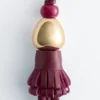 Pendentif en cuir à pompon