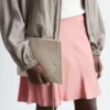 Portefeuille en cuir tressé