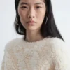 Pull en maille bouclée