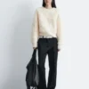 Pull en maille bouclée