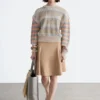 Pull en maille à empiècements rayés