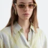 Robe chemise plissée à la taille