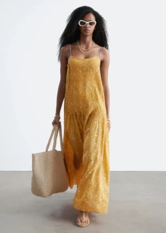 Robe longue à corsage plissé