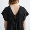 Robe midi plissée à manches dolman
