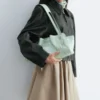 Sac bandoulière en cuir discret