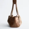 Sac bandoulière en cuir discret