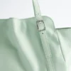 Sac bandoulière en cuir discret