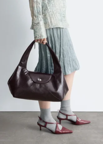 Sac bandoulière en cuir incurvé
