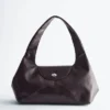 Sac bandoulière en cuir incurvé