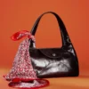 Sac bandoulière en cuir incurvé
