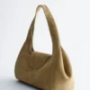 Sac bandoulière incurvé