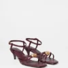 Sandales en cuir à talons ornées
