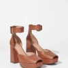 Sandales à talons compensés en cuir