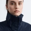 Veste à col montant et cordon de serrage