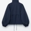 Veste à col montant et cordon de serrage