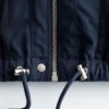 Veste à col montant et cordon de serrage