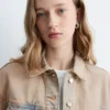 Veste courte en denim surteint